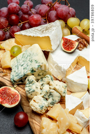 Camembert cheese with honey, figs, walnuts on Camembert cheese with honey, figs, walnuts on 39786809