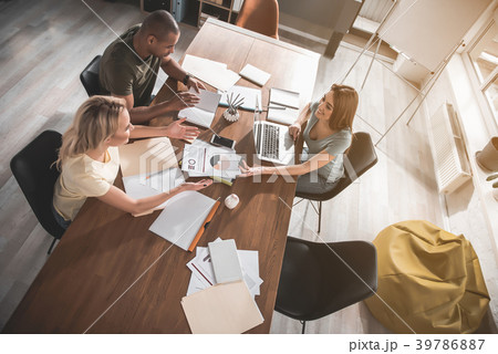 Young team developing business plan 39786887