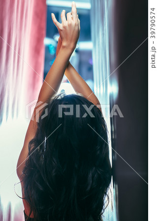 Back view of young girl with arms outstretched. Relax concept 39790574