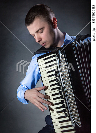 Playing the accordion Playing the accordion 39790598