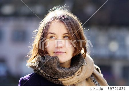 pretty young girl outdoors in sunny spring day 39791821