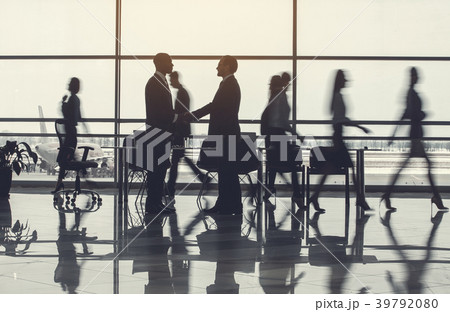Satisfied workers greeting with each other Satisfied workers greeting with each other 39792080