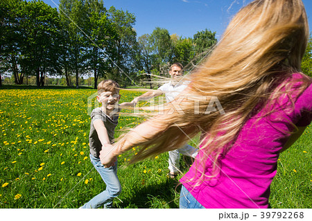 Family having fun in park 39792268