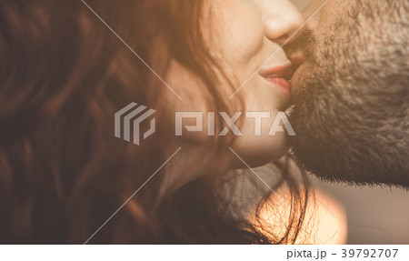 Affectionate couple kissing with love 39792707