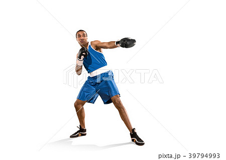 Sporty man during boxing exercise. Photo of boxer Sporty man during boxing exercise. Photo of boxer 39794993
