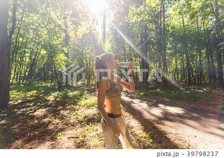 Fitness beautiful woman drinking water and Fitness beautiful woman drinking water and 39798237