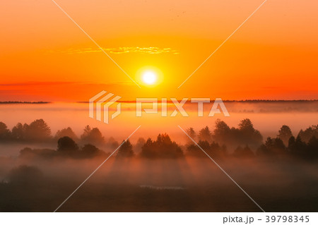 Amazing Sunrise Over Misty Landscape. Scenic View Amazing Sunrise Over Misty Landscape. Scenic View 39798345