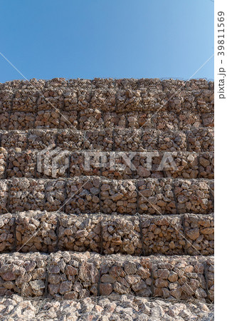 Rock wall protects mountain landslide Rock wall protects mountain landslide 39811569
