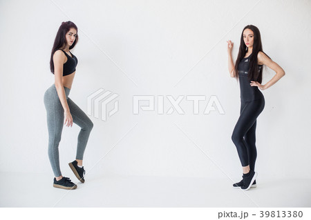 Full-length horizontal shot of two attractive 39813380