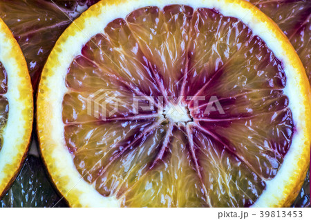 round slices of red orange, background and texture round slices of red orange, background and texture 39813453