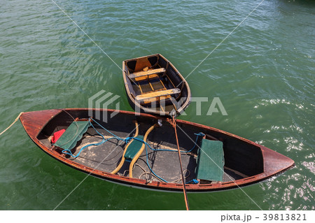 Two empty boats for remelting, moored on the 39813821