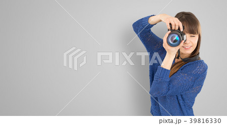 Portrait of a photographer with camera. 39816330