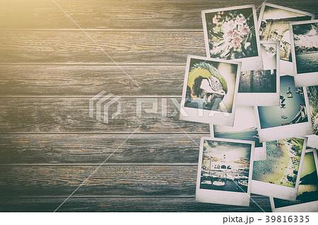 Frame with old paper and photos. 39816335