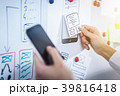 Designer drawing website ux app development. 39816418