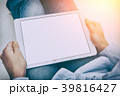 Tablet white background holding woman concept. 39816427