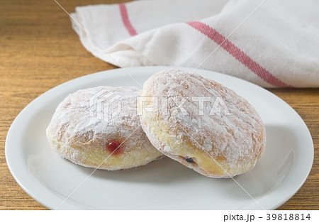 Two Delicious Donut Filled with Strawberry Jam Two Delicious Donut Filled with Strawberry Jam 39818814