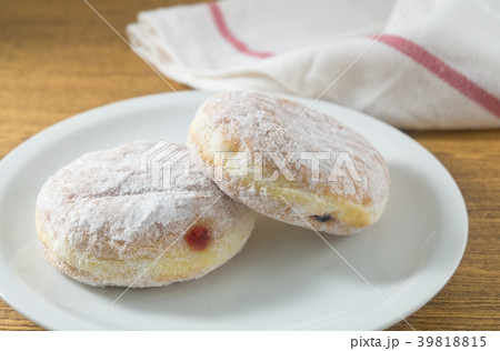 Two Fresh Donut Filled with Strawberry Jam Two Fresh Donut Filled with Strawberry Jam 39818815