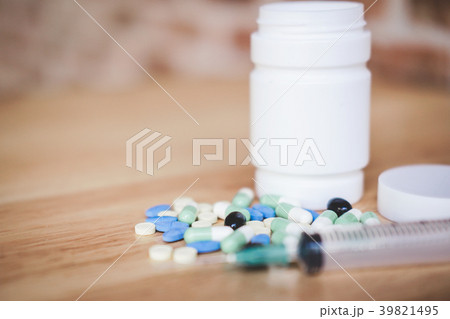 Medicine supplement and drug on wooden background, Close up of c Medicine supplement and drug on wooden background, Close up of c 39821495