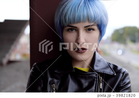 Portrait of beautiful girl with blue hair and red 39821820