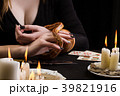 A woman will hold her hand to a snake 39821916