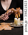 A woman will hold her hand to a snake 39821923