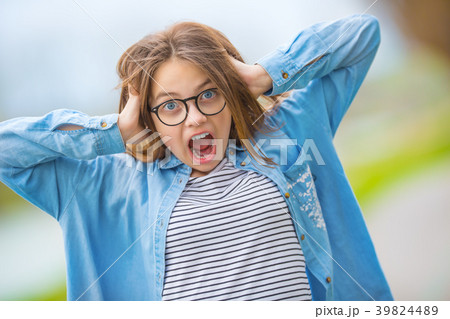 Portrait of crazy happy smilling teenage girl. Portrait of crazy happy smilling teenage girl. 39824489