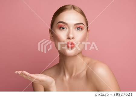 Coquettish girl with good looking appearance Coquettish girl with good looking appearance 39827021