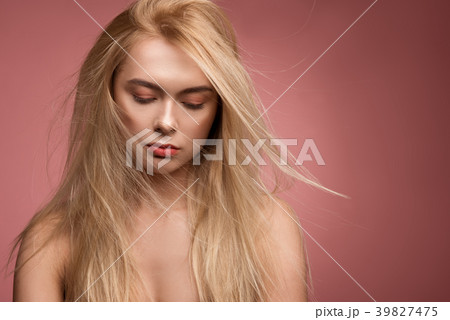 Calm female person with beautiful hair Calm female person with beautiful hair 39827475