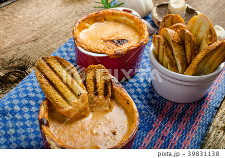 Tomato and cheese dip baked with crispy garlic toast Tomato and cheese dip baked with crispy garlic toast 39831138