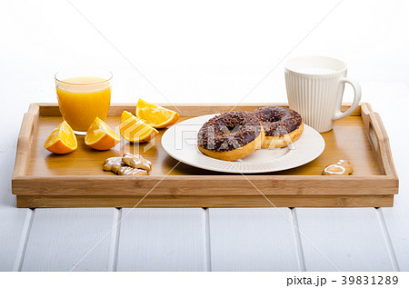 Breakfast tray donut orange and milk Breakfast tray donut orange and milk 39831289