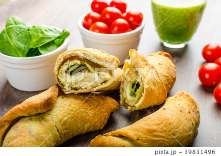 Mini Calzone roll with herbs and cheese Mini Calzone roll with herbs and cheese 39831496