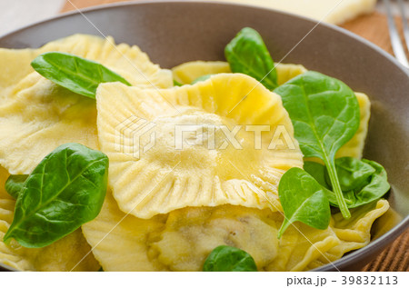Homemade ravioli stuffed with spinach and ricotta Homemade ravioli stuffed with spinach and ricotta 39832113