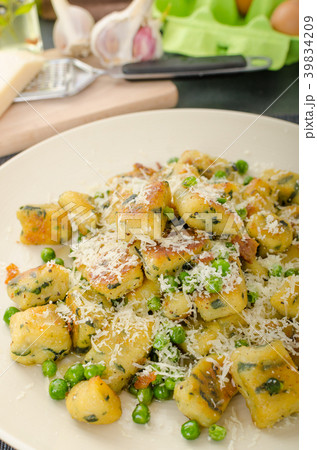 Homemade Gnocchi with Peas and Parmesan Homemade Gnocchi with Peas and Parmesan 39834209