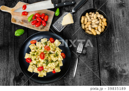 Home made ravioli with basil pesto 39835189