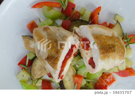 Grilled chicken breast with feta cheese 39835707