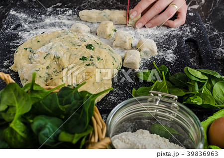 Making of homemade spinach gnocchi 39836963