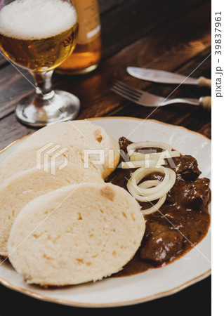 Goulash with dumplings Goulash with dumplings 39837961