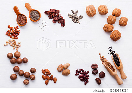 Spoon of various legumes and different of nuts  39842334