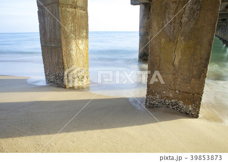 concrete bridge pole on sea beach concrete bridge pole on sea beach 39853873