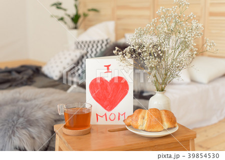Mother's Morning breakfast on wooden tray. Mother's Morning breakfast on wooden tray. 39854530
