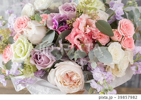 Close-up Beautiful Bouquet. Spring flowers on gray 39857982