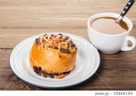 chocolate bun and cup of coffee chocolate bun and cup of coffee 39866194