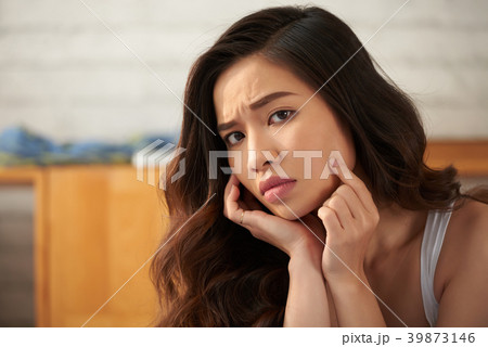 Pretty unhappy woman Pretty unhappy woman 39873146