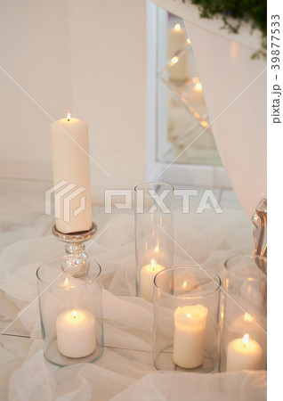 The atmosphere of relaxation.Burning candles and a 39877533