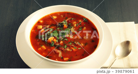 Tomato soup with red beans, potato and carrot. 39879061