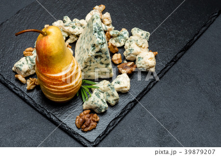 Slice of French Roquefort cheese and pear Slice of French Roquefort cheese and pear 39879207
