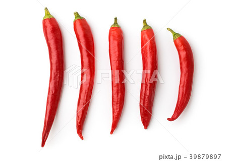 Five red chilli peppers on a white background Five red chilli peppers on a white background 39879897