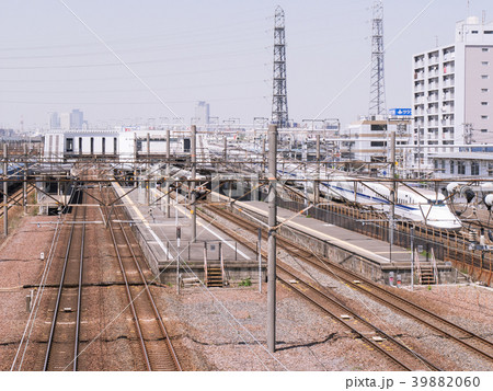 Jr 笠寺駅と名古屋駅中心部ビル群の写真素材