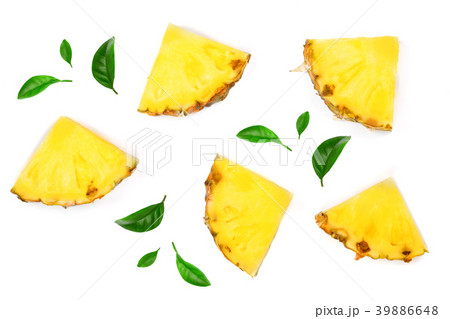 Sliced pineapple decorated with leaves isolated on 39886648