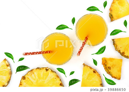 juice in a glass and pineapple slices decorated 39886650